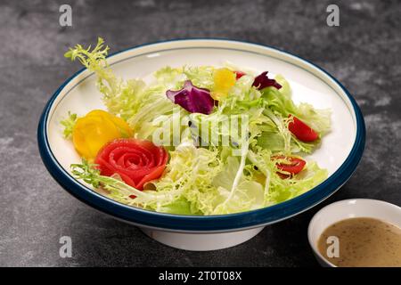 mixed assorted vegetable salad, Chrysanthemum(Escarole endive)  with Sauce Stock Photo