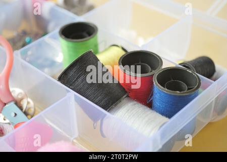 Tools and accessories for sewing on color background  Stock Photo