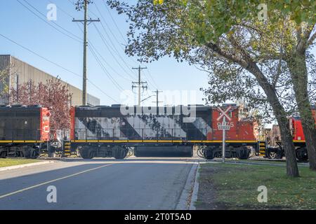 1 October 2023 - Calgary Alberta Canada - CR Locomotive Crossing a road Stock Photo