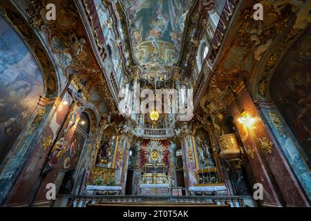 Munich, Germany, EU - Sept. 13, 2023. Inside of Asamkirche, Asam Church in Old Town Munich. A famous Rococo style church, known for  Baroque interior. Stock Photo