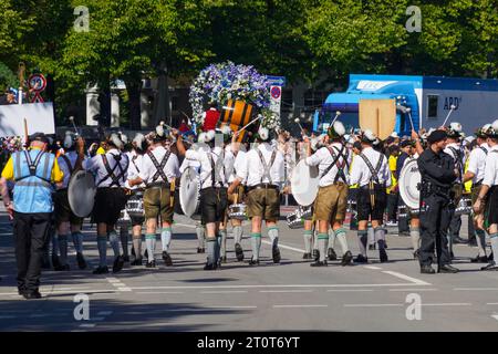 Munich, Germany, EU - September 16, 2023. Oktoberfest parade in Munich with floats, bands in traditional German clothing, Dirndls and Lederhosen. Stock Photo