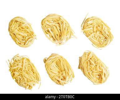 some 'nests' of typical fresh egg pasta on a transparent background Stock Photo