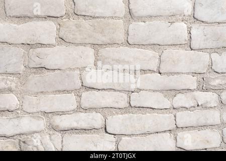 Nineteenth-century road pavement made with small blocks of marble Stock Photo