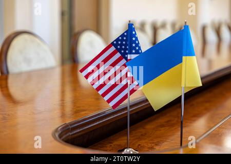 flags of United States and Ukraine. international negotiations. conclusion of contracts between countries. concept of communication between representa Stock Photo