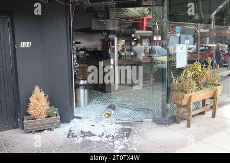 London, UK. 09th Oct, 2023. Pita, a Kosher restaurant in Golders Green, north London, which has had it's glass door smashed and contents robbed. A nearby railway bridge has had 'Free Palestine' spray painted on it. Police in London are stepping up their patrols following an escalation in the conflict between Isreal and Hamas. Photo credit: Ben Cawthra/Sipa USA Credit: Sipa USA/Alamy Live News Stock Photo