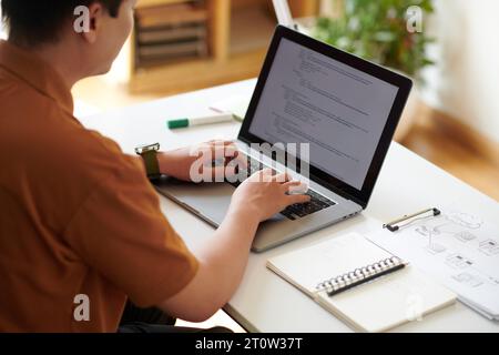 Cropped image of IT specialist testing programming code Stock Photo