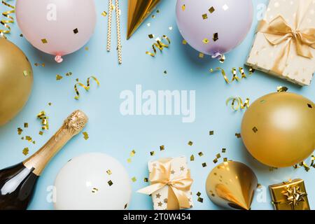 Party background with balloons, streamers and confetti on pastel blue  background. Birthday party decoration Stock Photo - Alamy