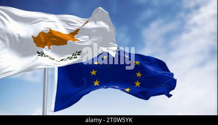 Cyprus national flag waving in the wind with the European Union flag on a clear day. 3d illustration render. Fluttering fabric. Stock Photo