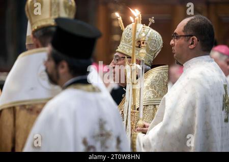 Italy, Rome, Vatican, 2023/10/9. Members of the clergy take part in the celebration of a mass, presided over by Patriarch of the Greek-Melkite Catholic Church Youssef Absi, at the altar of the chair of St. Peter's Basilica, on the sidelines of 16th General Assembly of the Synod of Bishops at the Vatican . Photograph by ALESSANDRA BENEDETTI /POOL/ Catholic Press Photo Stock Photo