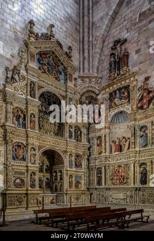 altarpiece, altar and tomb of Santa Librada, virgin and martyr in the transept of the cathedral of Santa Maria la Mayor in the city of Sigüenza, Spain Stock Photo