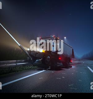 Demolished armored truck on the roadside. A vehicle hit in the crash barrier. Thieves destroyed doors and money flew all over the road from the opened Stock Photo