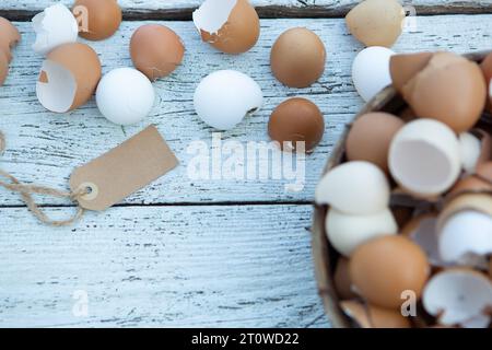 10 February 2023: Easter, broken eggs shells on light wood in a basket *** Ostern, zerbrochene Eier Schalen auf hellem Holz in einem Korb Credit: Imago/Ģ����ý Live News Stock Photo