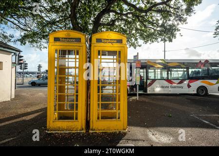 Guernsey, October 3rd 2023: Yellow telephone boxes in St Peter Port Stock Photo