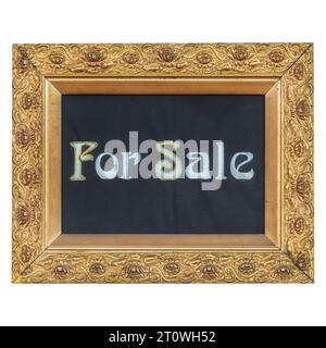 Antique for sale sign in an ancient ornamental gold colored wooden frame Stock Photo