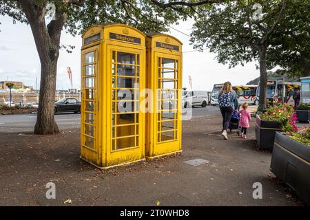 Guernsey, October 4th 2023: Yellow telephone boxes in St Peter Port Stock Photo