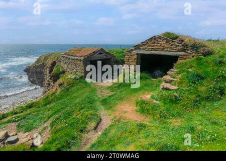 Traditional fishermen's huts at Marwick Head, Orkney, Scotland. Stock Photo