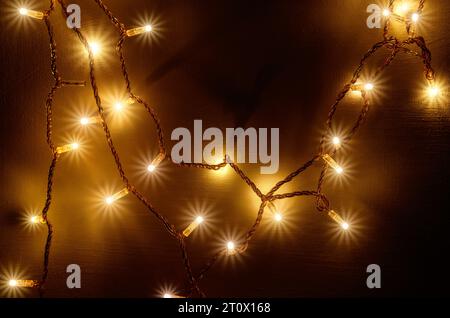 Multi-colored New Year's garlands with LED lamps on wires. New Year's decor Stock Photo