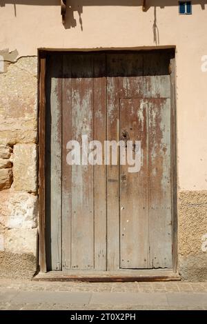 Wooden doorway. Nice texture of its surface. Stock Photo