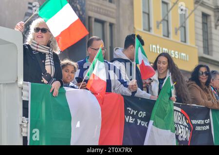 New York City, United States. 9th October, 2023. Italian New Yorkers are seen waving flags during the annual Italian Heritage Day Parade along Fifth Avenue in New York City. Credit: Ryan Rahman/Alamy Live News Stock Photo