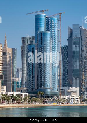 Skyline of West Bay with Corniche Park Towers aka QIMC Tower, Doha, Qatar Stock Photo