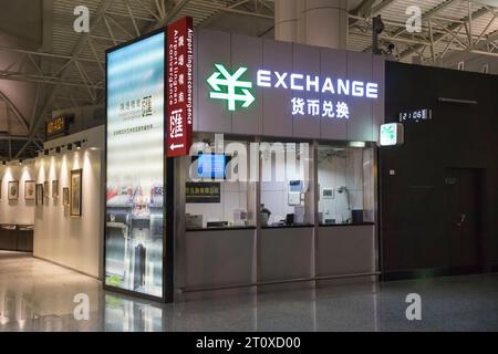 Money exchange facility at Guangzhou Baiyun International Airport, China Stock Photo