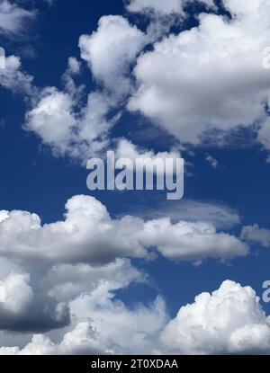 Perfect cumulus cloud cover in the desert near Taos New Mexico Stock Photo