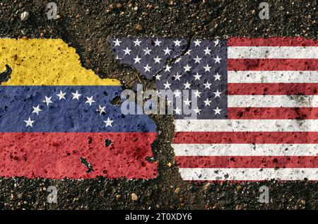 On the pavement are images of the flags of Venezuela and the United States, as a symbol of confrontation. Conceptual image. Stock Photo