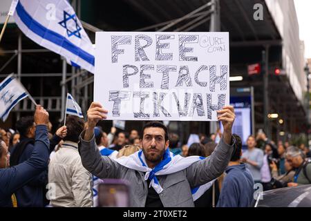 New York, USA. 08th Oct, 2023. A protester holds up a sign as counter protesters of the All Out for Palestine rally gather in New York, NY, October 8, 2023.(Photo by Hailstorm Visuals/Sipa USA) Credit: Sipa USA/Alamy Live News Stock Photo
