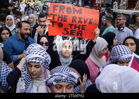 Beirut, Beirut, Lebanon. 9th Oct, 2023. A woman is light by light ...