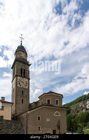 Cogne, Italy-May 30, 2023; Low angle view of collegiate church of Saint Ursus dedicated to Saint Ursus of Aosta Stock Photo