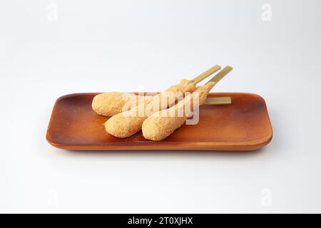 rice cakes covered with sweet soybean flour isolated on white background Stock Photo