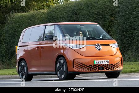 Bicester,Oxon.,UK - Oct 8th 2023:  2023 orange VOLKSWAGEN ID BUZZ 1ST EDITION electric car driving on an English country road. Stock Photo