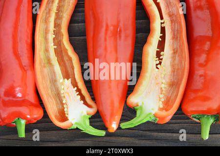 Fresh red chili peppers on wooden background Stock Photo