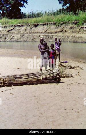 People on the banks of the White Volta river in northern Ghana, c.1959 Stock Photo