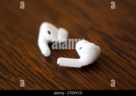 AirPod Pro, white wireless Bluetooth earbuds sold by Apple featuring noise cancelling technology Stock Photo