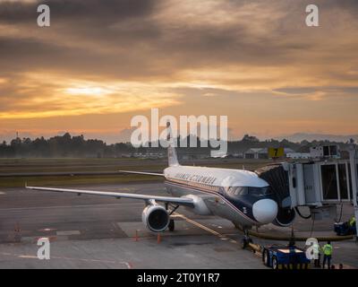 Rionegro, Colombia September 21 2023, modern Avianca Airlines plane with vintage painting stationed in an airport during sunrise before takeoff Stock Photo