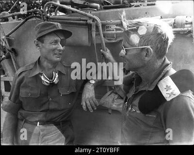 1973 - Israel - Yom Kippur War 1973 Moshe Dayan talking to an Israeli General Adnan at the Siuoi front. The Yom Kippur War, also known as the Ramadan War, the October War, the 1973 ArabCIsraeli War, or the Fourth ArabCIsraeli War, was an armed conflict fought from October 6 to 25, 1973, between Israel and a coalition of Arab states led by Egypt and Syria. (Credit Image: © Keystone Press Agency/ZUMA Press Wire) EDITORIAL USAGE ONLY! Not for Commercial USAGE! Stock Photo