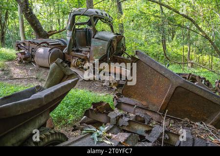 Rusted and dilapidated vintage farm trucks at McDaniel Farm Park in Duluth, Georgia. (USA) Stock Photo