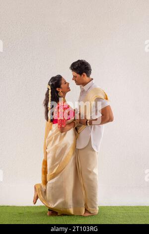 South Indian couple standing together Stock Photo - Alamy