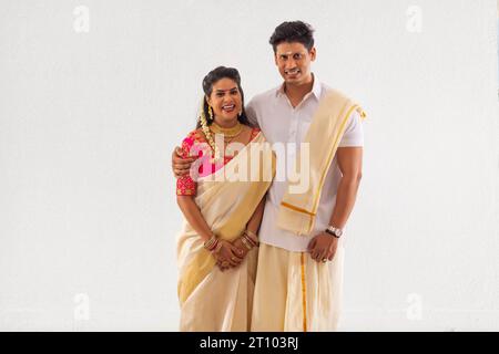 South Indian couple standing together Stock Photo - Alamy