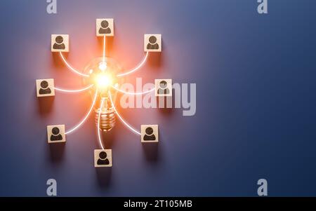 Brainstorming teamwork creative ideas and innovation concept. Wooden cube blocks and light bulb. Group brainstorm for solving problems and start up. Stock Photo