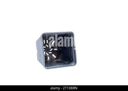 Rectangular plastic container for plants with drainage holes on isolated white background Stock Photo