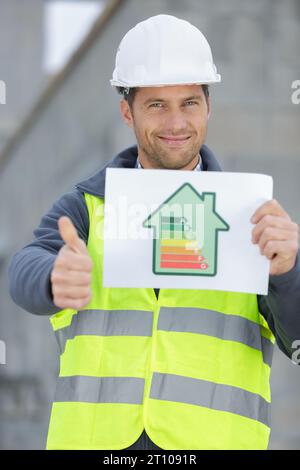 man holding an energy efficient chart Stock Photo