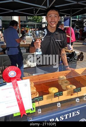 HM Pasties stall with award for chickpea curry pies, 2 Time Square, Warrington, Cheshire, England, UK,  WA1 2NT Stock Photo