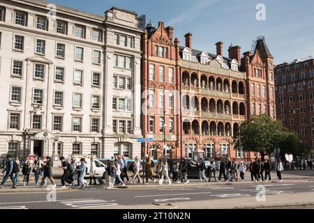 Enrolling students from King's College London walking past the Royal Waterloo Hospital for Children and Women, Lambeth, London SE1, England, U.K. Stock Photo