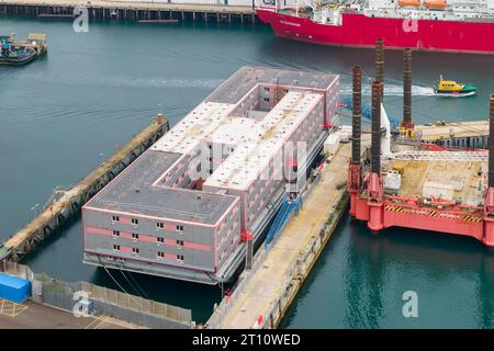 Portland, Dorset, UK.  10th October 2023.  General view from the air of the empty Bibby Stockholm immigration barge at Portland Port near Weymouth in Dorset.  Letters have been sent out to asylum seekers informing them that they will be relocated to the barge on Thursday 19th October 2023.  The barge was evacuated two months ago due the discovery of Legionella bacteria in the water.   Picture Credit: Graham Hunt/Alamy Live News Stock Photo