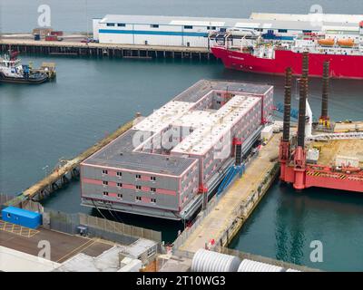 Portland, Dorset, UK.  10th October 2023.  General view from the air of the empty Bibby Stockholm immigration barge at Portland Port near Weymouth in Dorset.  Letters have been sent out to asylum seekers informing them that they will be relocated to the barge on Thursday 19th October 2023.  The barge was evacuated two months ago due the discovery of Legionella bacteria in the water.   Picture Credit: Graham Hunt/Alamy Live News Stock Photo