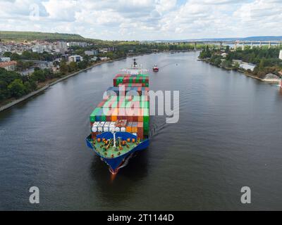 Aerial top view container ship, logistics import export, shipping or transportation concept background. Stock Photo