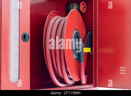 Fire hose reel industrial building hi-res stock photography and