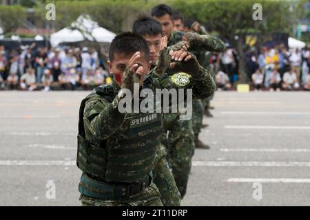 Taipei, Taiwan. 10th Oct, 2023. Troops from Taiwan's special forces perform a drill during Taiwan National Day, also called Double Ten, in downtown Taipei on October 10, 2023. Credit: ZUMA Press, Inc./Alamy Live News Stock Photo